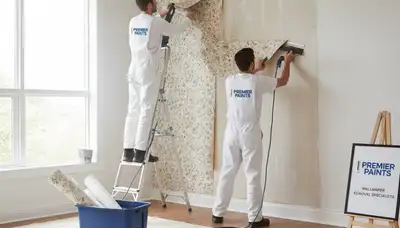 Wallpaper removal service in Greenville, NC by Greenville Paint Pros preparing walls for repainting